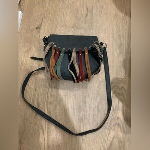 Mint condition Dolce Vita Western fringe cross body bag vegan leather& suede